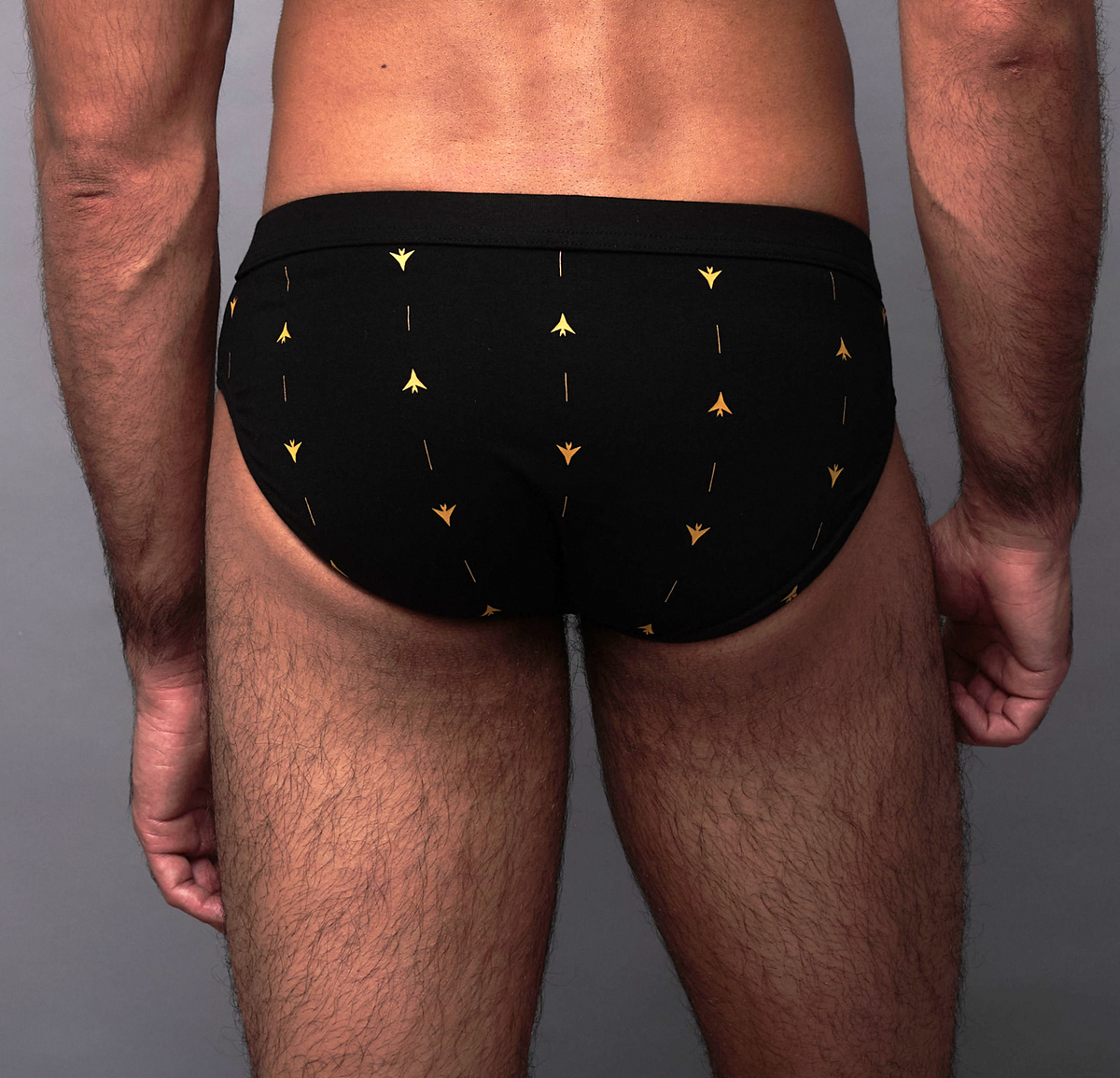 ELIO Black low-rise briefs, rear view on model