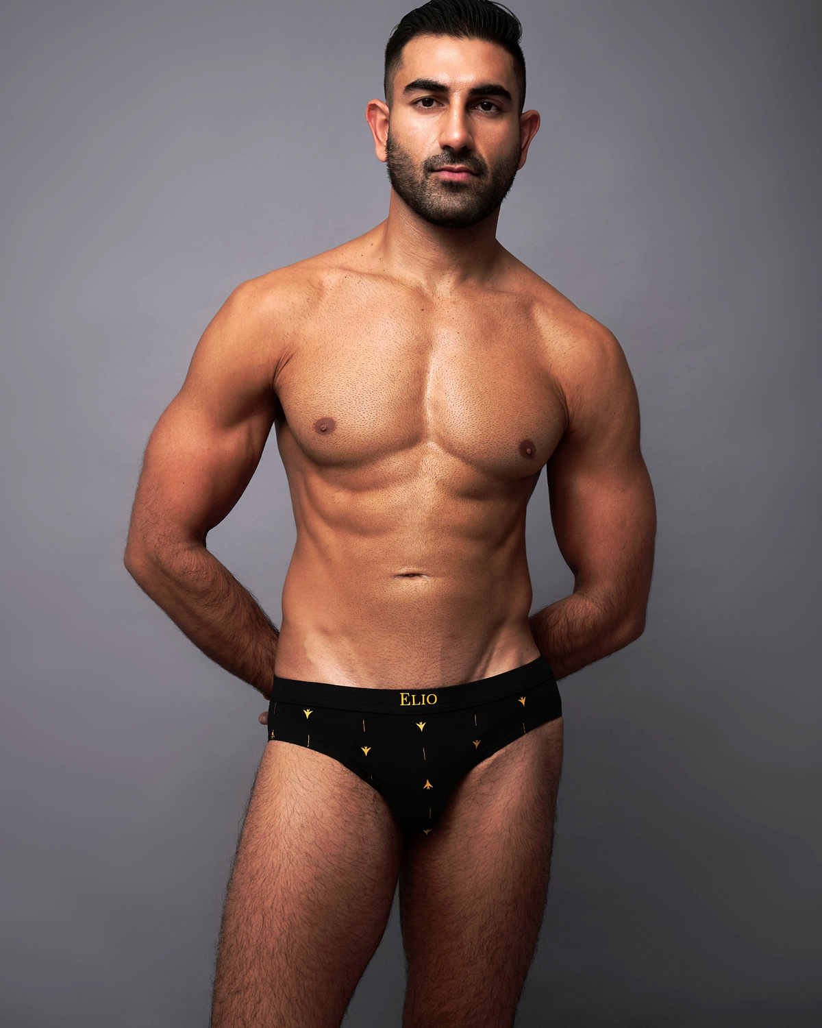 ELIO Black low-rise briefs, front view on model